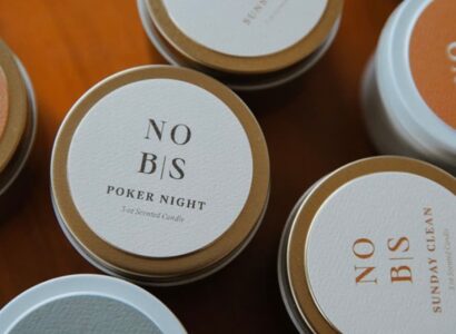 overhead view of tin candle labels