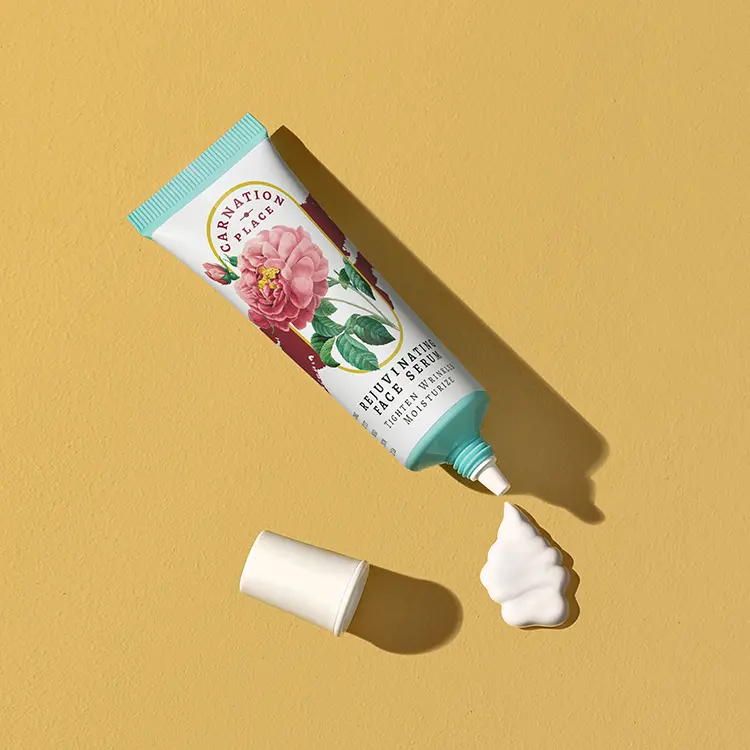face serum tube with squeezable label material