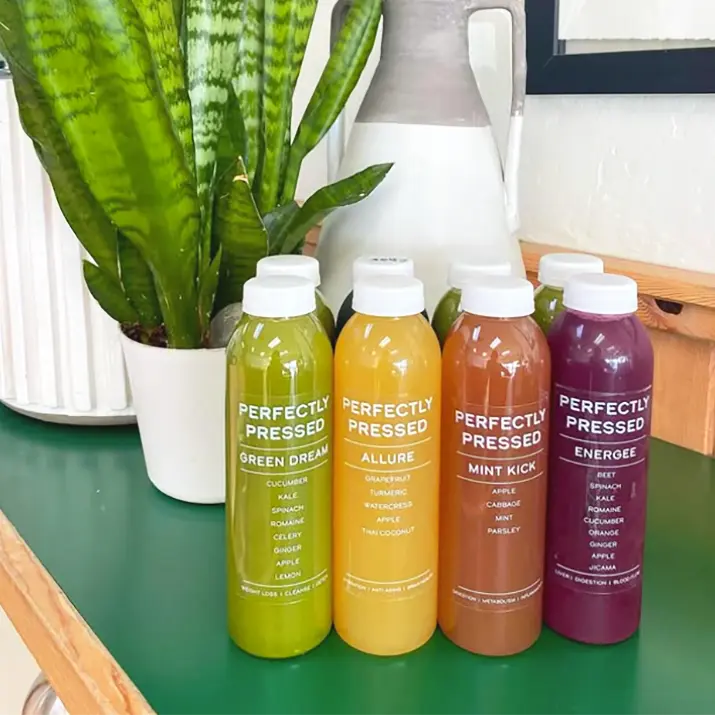 perfectly pressed juice bottles with clear labels